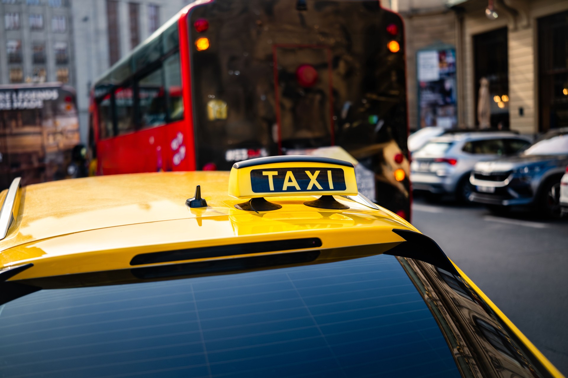 Yellow Taxi Car With Taxi Sign On A Roof